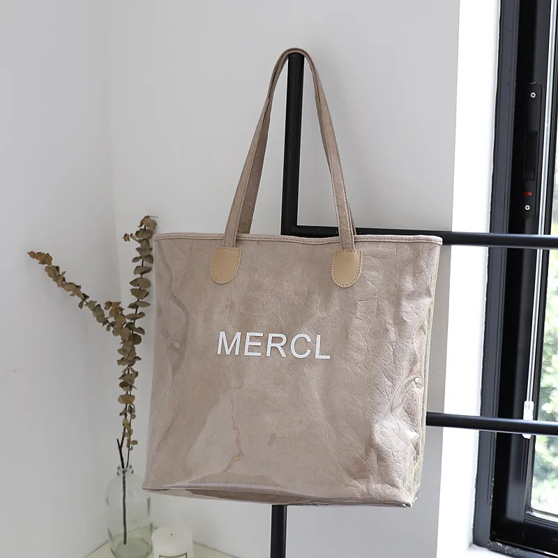 

Fashion eco-friendly letter one shoulder handbag ins double transparent pvc handbag waterproof kraft paper shopping bag