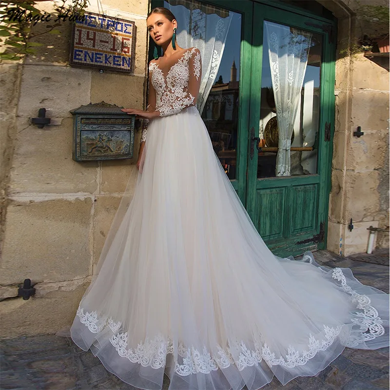 

Magic Awn Long Sleeves Lace Tulle Wedding Dresses Appliques Illusion Light Champagne Elegant Mariage Gowns A-Line Abito Da Sposa