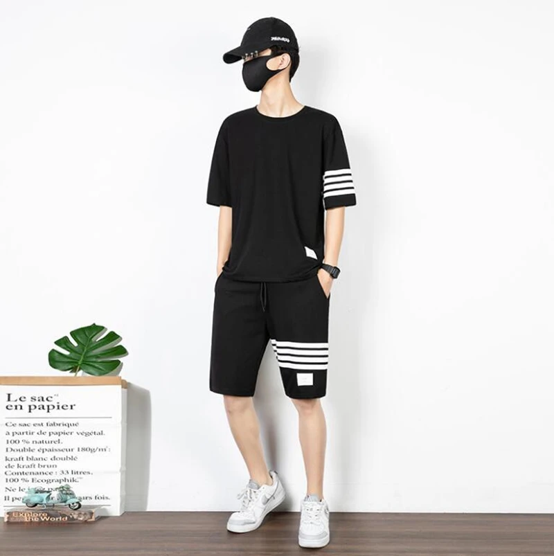 Костюм спортивный мужской из 2 предметов быстросохнущий с коротким рукавом |