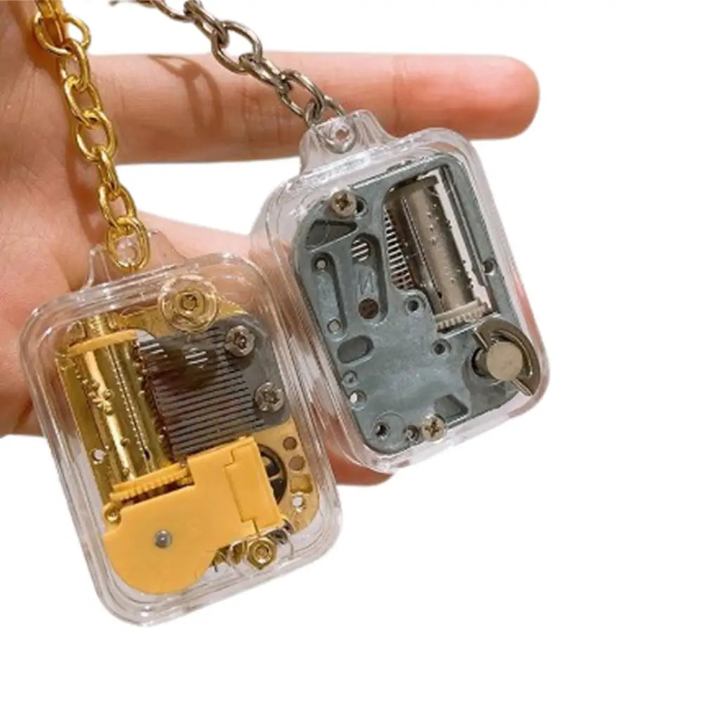 

Kids Acrylic Music Box Movement Keychain Toys Portable DIY Baby Handy Crank Musical Instrument Toy for Baby Birthday Gifts