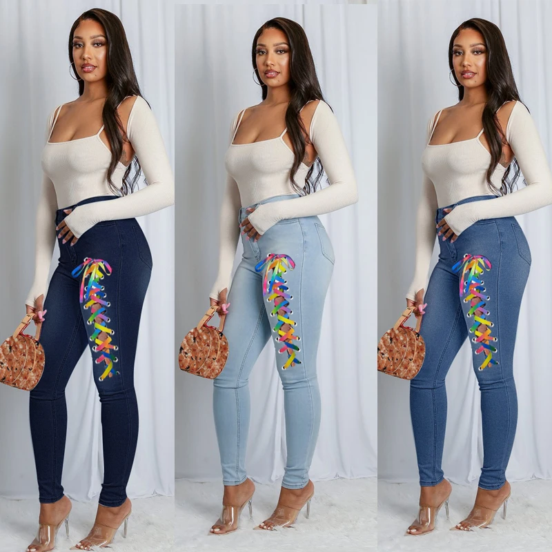 

Женские рваные узкие джинсы с высокой талией и завязкой спереди