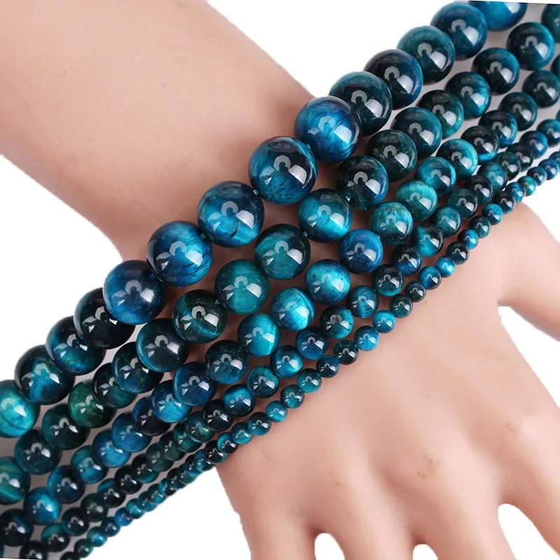 Бусины из натурального камня с кислотным синим цирконием и тигриным глазом