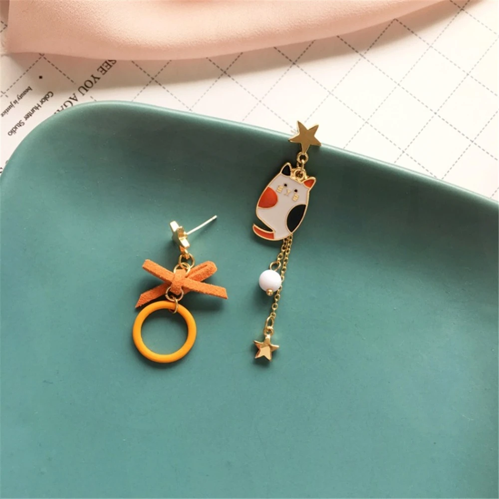 

Ruanme asymmetry of a pair of pearl earrings laughing cat earrings bowknot earrings face nifty lively star long eardrop fashion