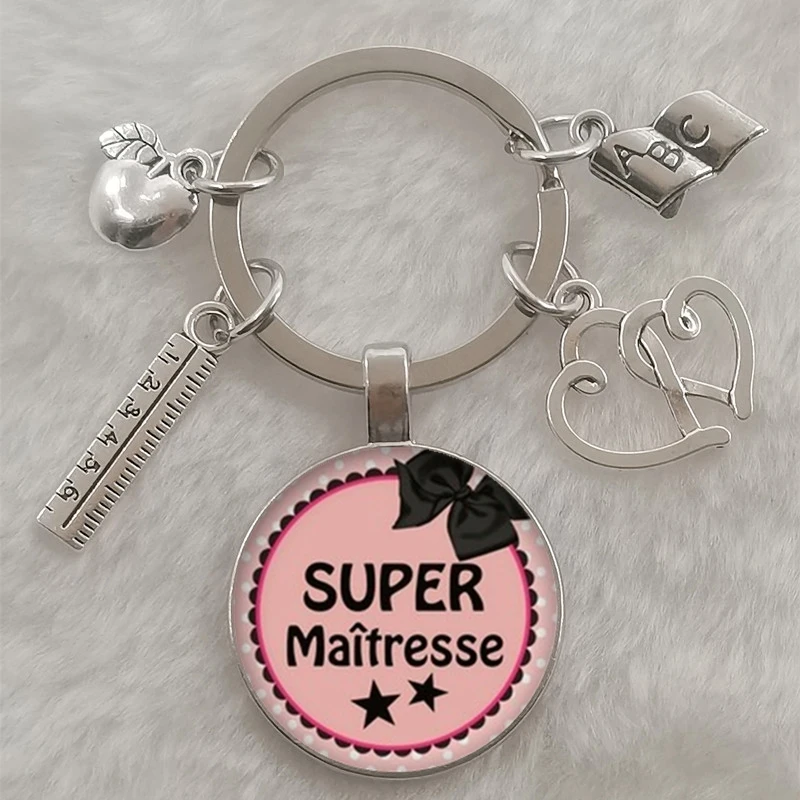 Fashion merci maitresse French word 25 mm glass cabochon dome DIY jewelry making keychain | Key Chains