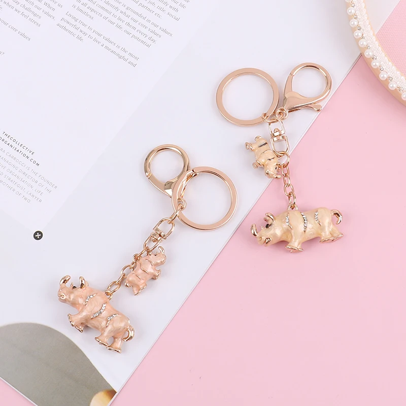 

Cattle Keychain Fashion Rhinestone Animal Cow Key Bag Case Wallet Key Holder Car Keyring Pendant Jewelry Women Crystal Gifts