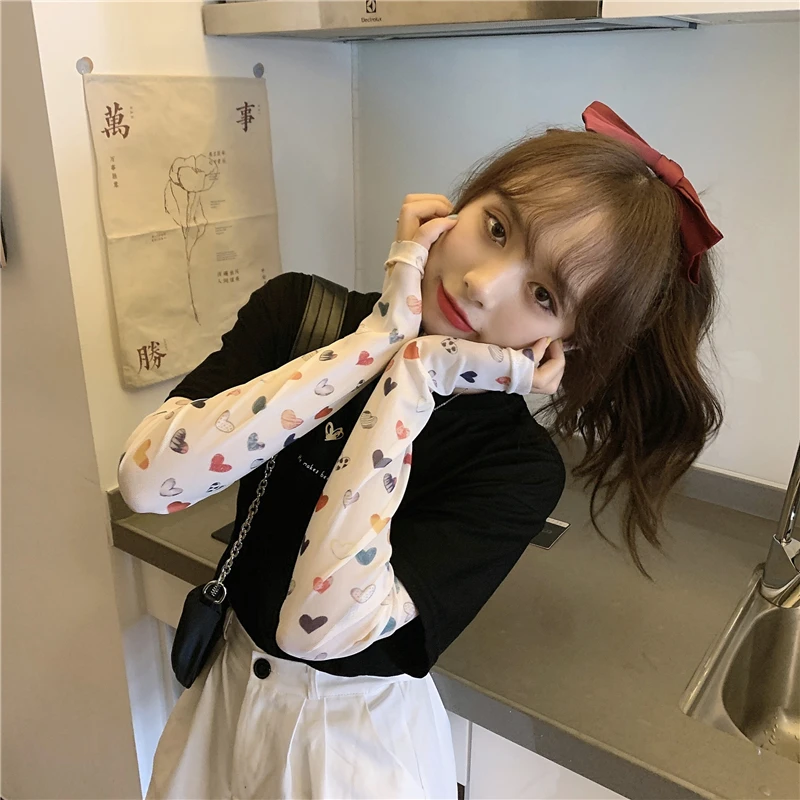 

New summer fake two-piece mesh stitching printing Korean of loose thin T-shirt