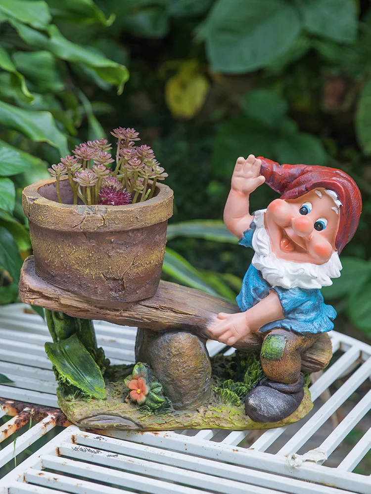 Уличный садовый декор статуя карликового эльфа машущая на морской волне
