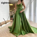 Зеленое атласное платье-бюстье с высоким разрезом и шлейфом