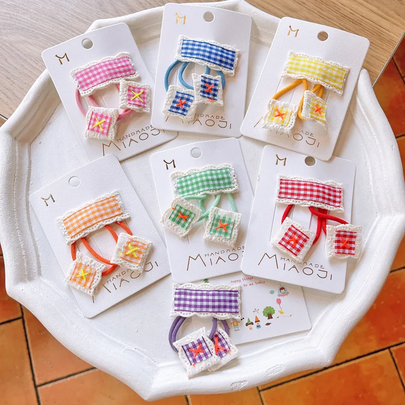 

Korean version of children's plaid fabric hair clips girls fluorescent lace side hair rope set 3 piece set