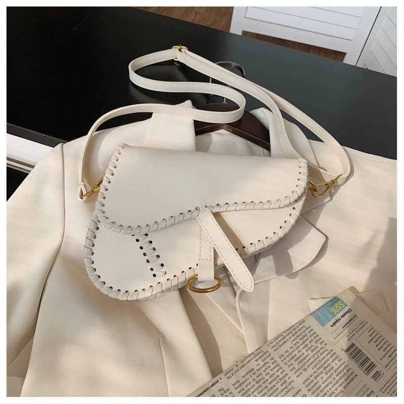 

Ms. 2021 new retro minimalist fashion saddle bag messenger bag ladies leather bag Messenger bag personality pistol