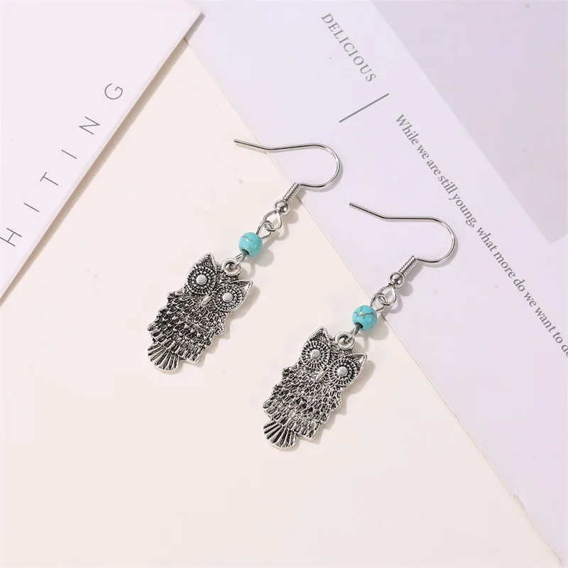 Серьги-подвески женские металлические золотистого цвета с крыльями совы |