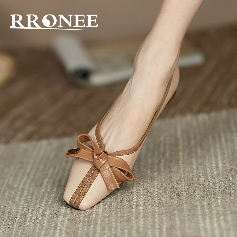 

Туфли-лодочки с бантом на низком каблуке