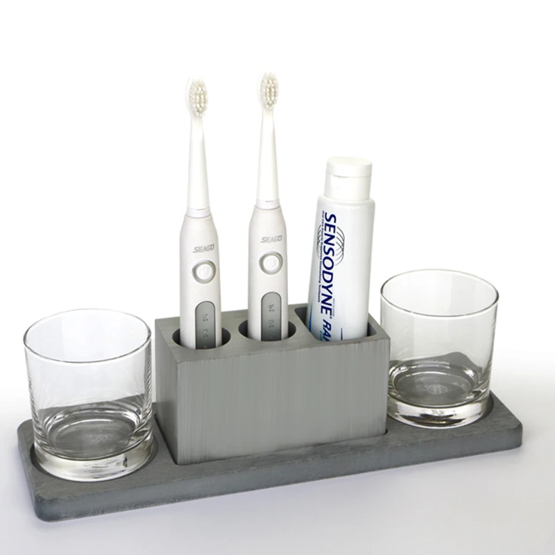 Ванная комната в ванной принимает три набора цементных маятниковых частей