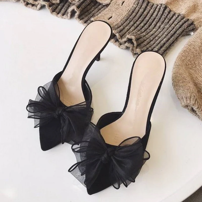 

2021 New Pointed Mules features an oversized and an upper finished in a soft shimmering champagne tone Dress Heel Slippers