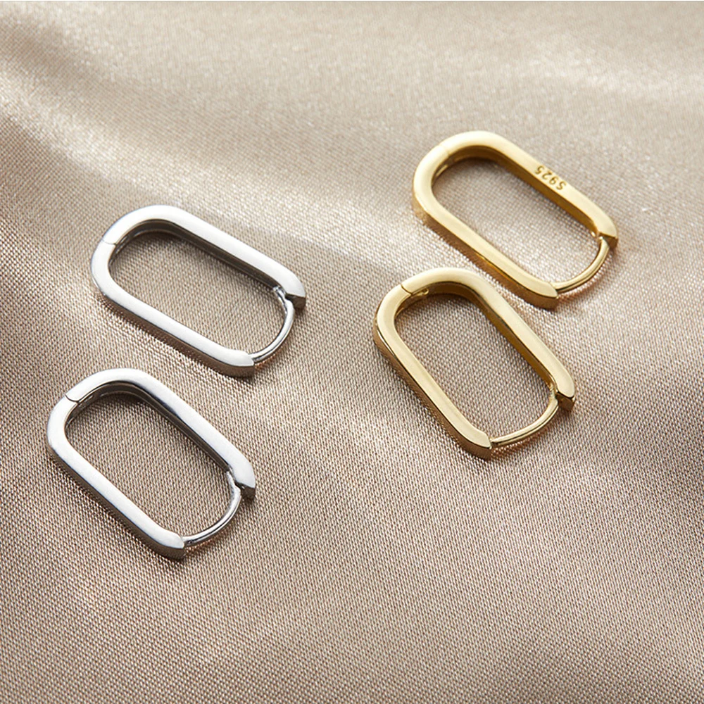 Серьги-кольца женские с геометрической застежкой золотого цвета из металла