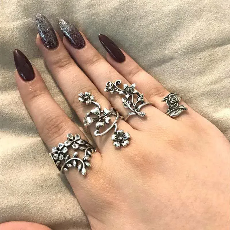 

Hot Sale Fashion Retro 4-piece Set of Hollow Carved Forest Vine Leaves Flowers Ladies Party Opening Ring Whole Sale Jewelry