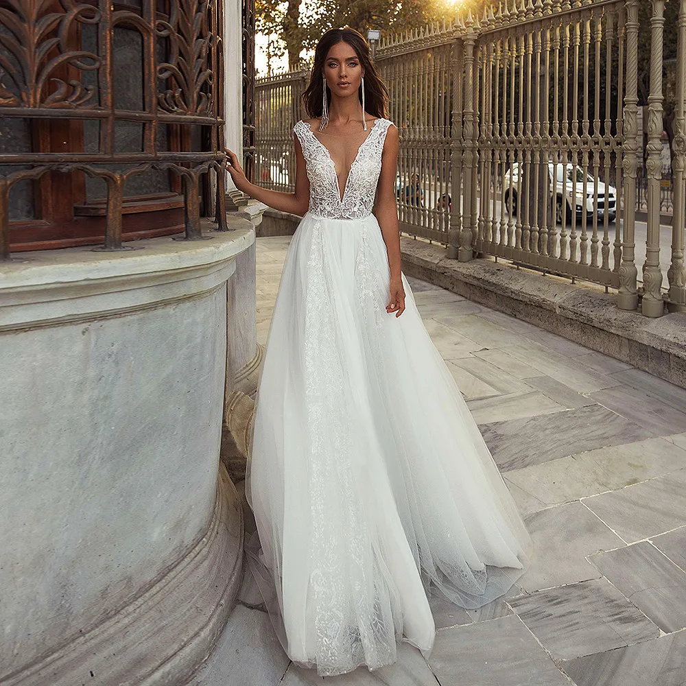 

Sexy Tulle Wedding Dresses 2021 Sparkling Beading Sequin V Neck Floor Length Bridal Gowns A-LINE Open Back Beach Robe De Mariee