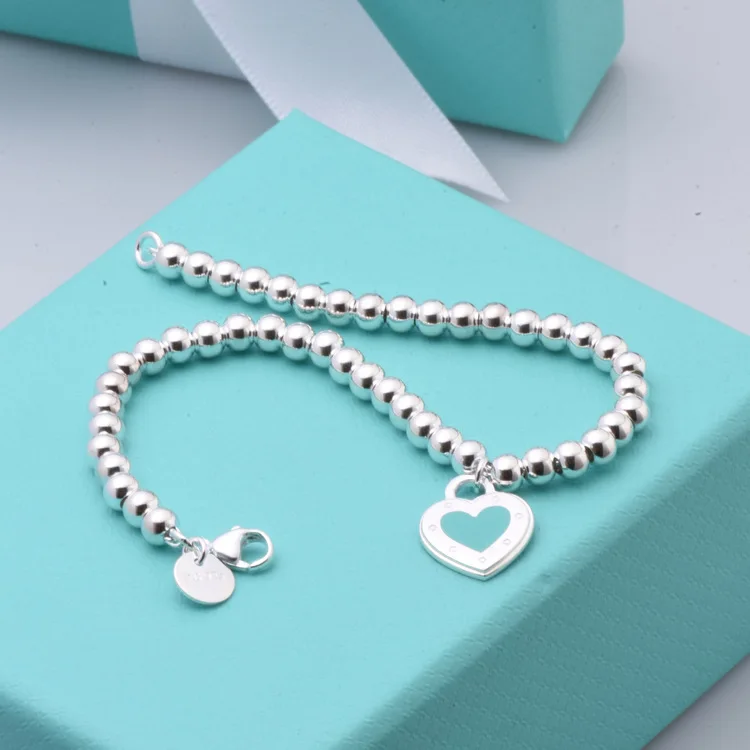 

S925 sterling silver heart-shaped blue enamel fashion bracelet as a gift bracelet for lovers