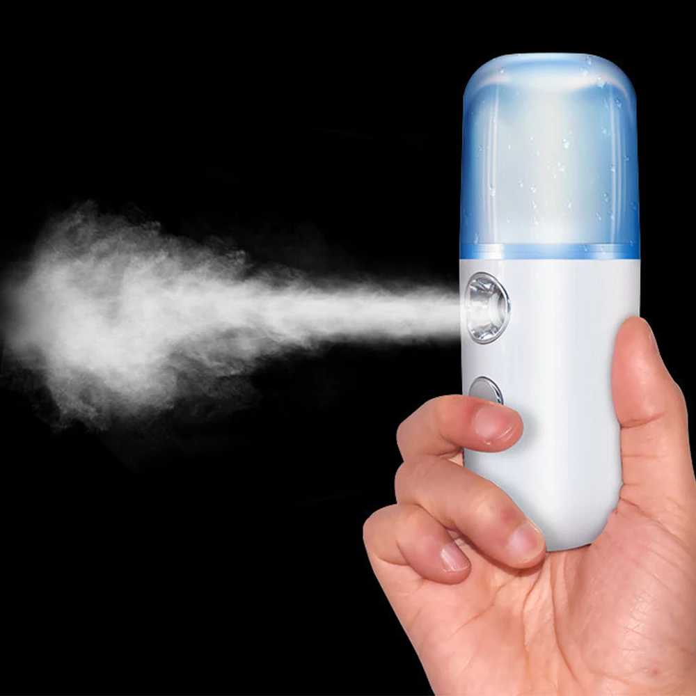 

Portable Small Air Humidifier USB Machine Moisturizing Milk Oil Diffuser Face Steamer Spray Cleaner Tool