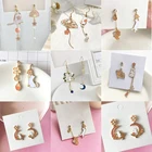 Женские асимметричные серьги-подвески с подвеской