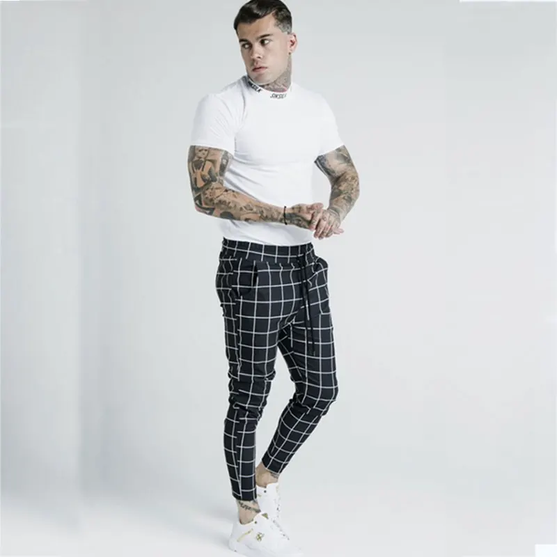 

Sik Sik Men's black plaid casual pants Fashion Korean men's sports and leisure plaid SIKSIK pants micro-elastic polyester fabric