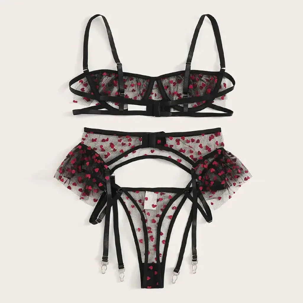 

Комплект женского сексуального нижнего белья из бюстгальтера и трусов с вырезами