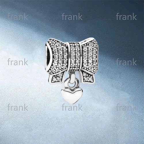

791776CZ Bow & Heart Clear CZ Charm