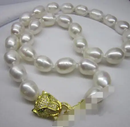 

AAA 10-11MM SOUTH SEA BAROQUE WHITE PEARL NECKLACE LEOPARD HEAD CLASP 18"