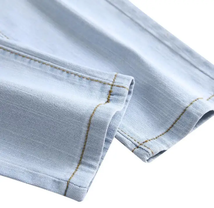 Мужские джинсы с цветочной вышивкой Модные зауженные рваные в стиле хип-хоп