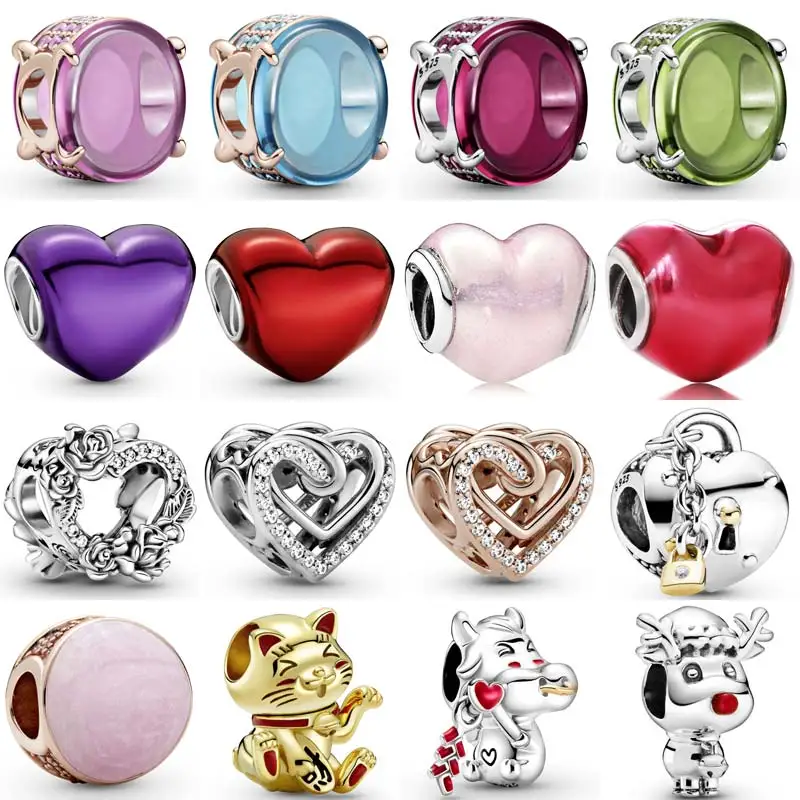 

Овальный кабошон розового цвета с металлическим сердцем и розовыми цветами