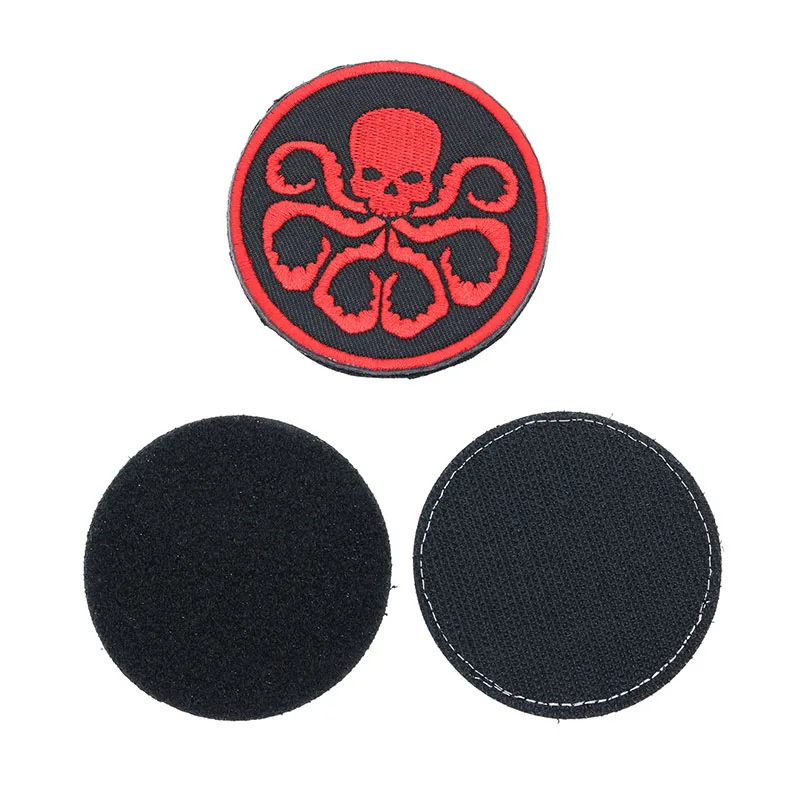 Значок девять змеиных родов Отдел отпуска и логотип агента подписанный двойной