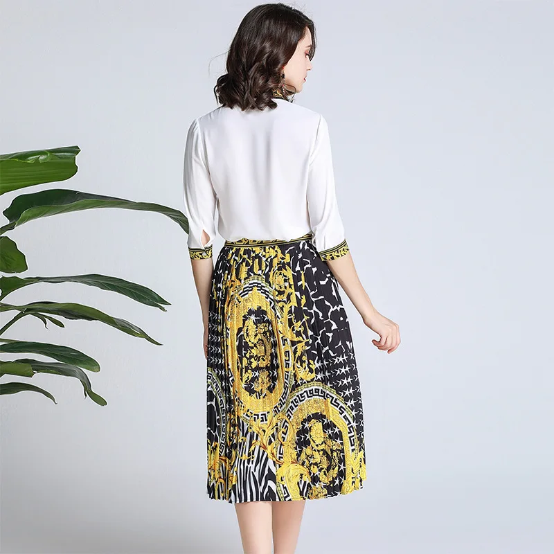 

Spring and Summer New Women's Pure White Polo Collar Top Loose Tight Waist Pleated Skirt Elegant Two-Piece Set