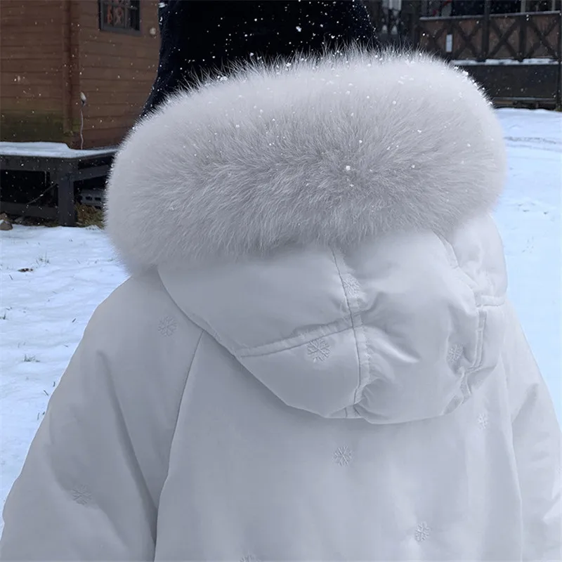 Женская длинная куртка пуховик на утином пуху с капюшоном и воротником из