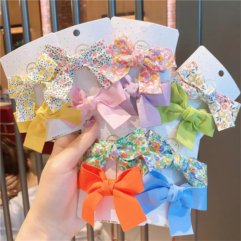

New Korean Baby Hair Accessories Bangs Clip Girls Hairpin Floral Headdress Child Princess Solid Color Bow Card Issuance Headwear