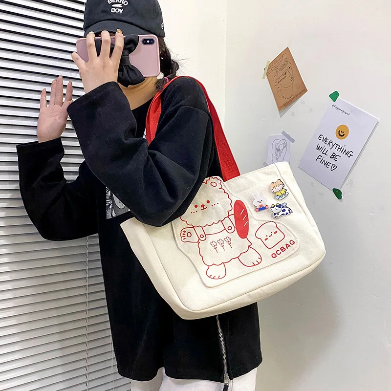 

Cute bear canvas hand bag female 2021 new large-capacity graffiti portable tote bag student shoulder bag