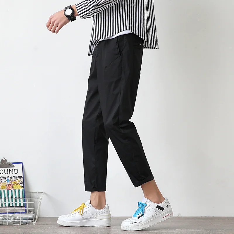 

Men's slim fitting small feet versatile loose black pants men's Korean fashion in 2021 summer