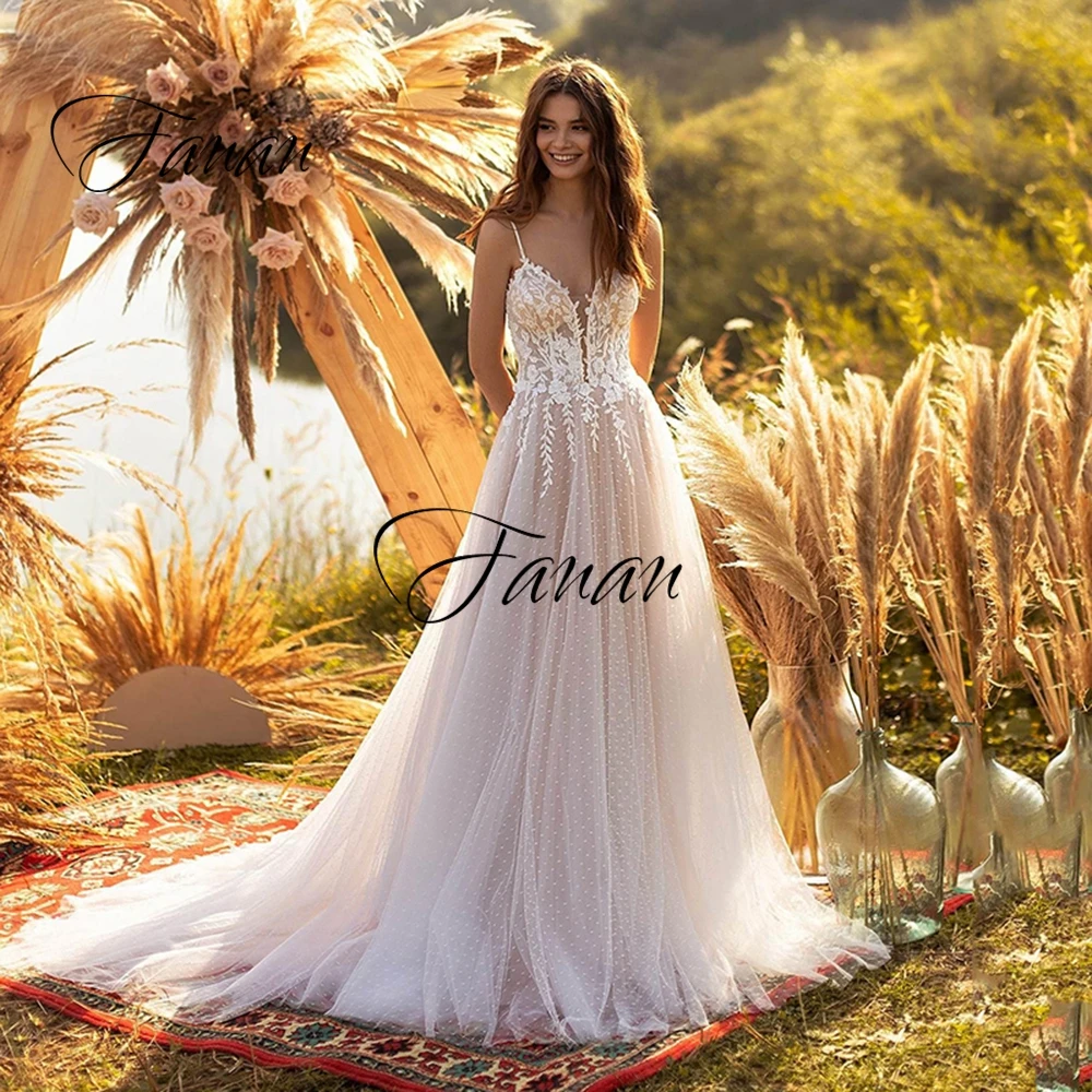

2021 Sexy Boho Spaghetti Straps Wedding Dress Backless Sleeveless Deep V-Neck Lace Appliques Tulle See-Through Bridal Gown