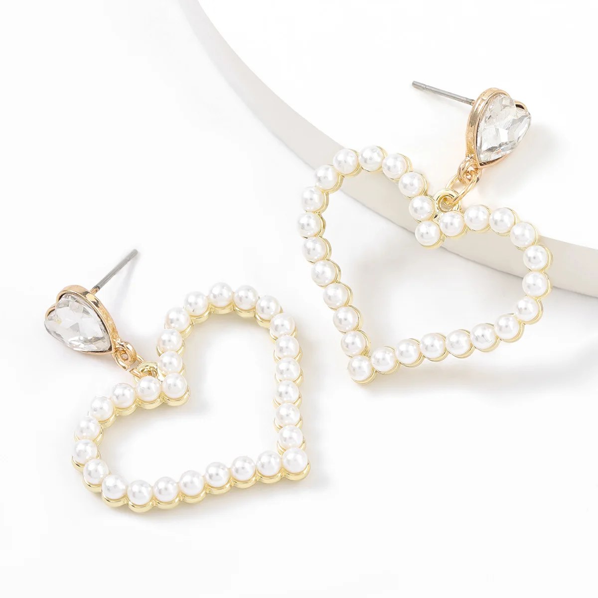 

2021 new fashion metal rhinestone imitation pearl heart-shaped earrings women's creative pop party jewelry accessories
