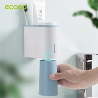 ECOCO Toothpaste Holder Wall-Mounted Toothbrush Storage Rack Magnetic Toothbrush Cup Holder Organizer Bathroom Storage Supplies