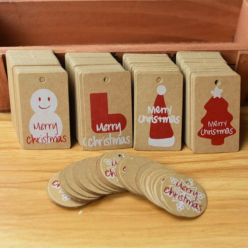 

100Pcs Merry Christmas DIY Kraft Paper Card Hang Tags With Rope Labels Gift Wrapping Decoration Christmas Party Label Supplies