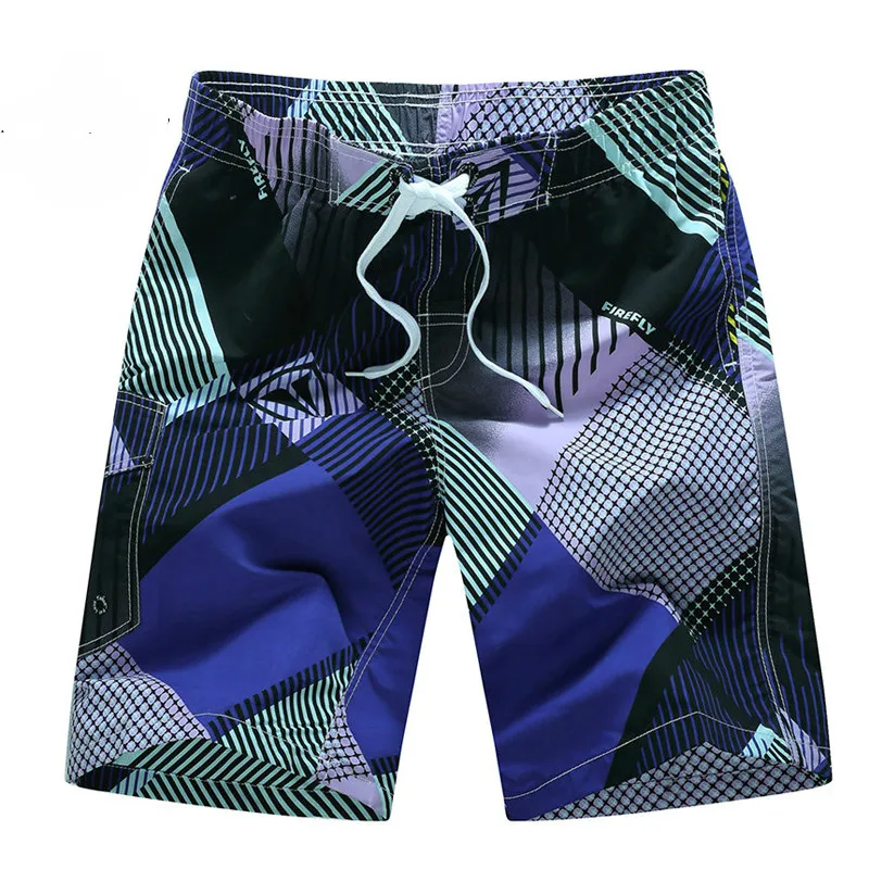 Мужские пляжные шорты темно синие быстросохнущие с цветочным принтом размеры до - Фото №1