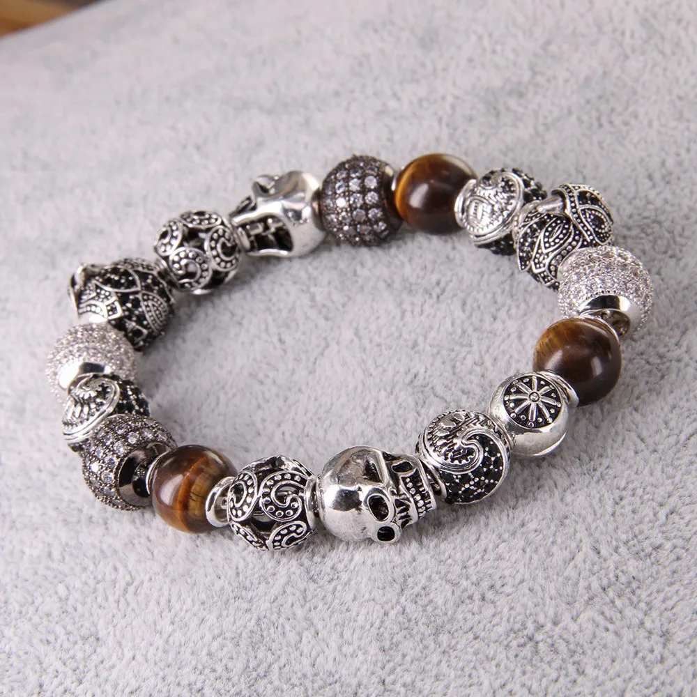 Браслет из бусин Thomas Style KM с орлом тигровым глазом совой черепом маори бусинами