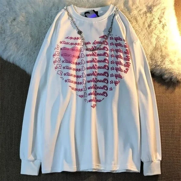 

Женский свитер с буффами и принтом на весну и осень