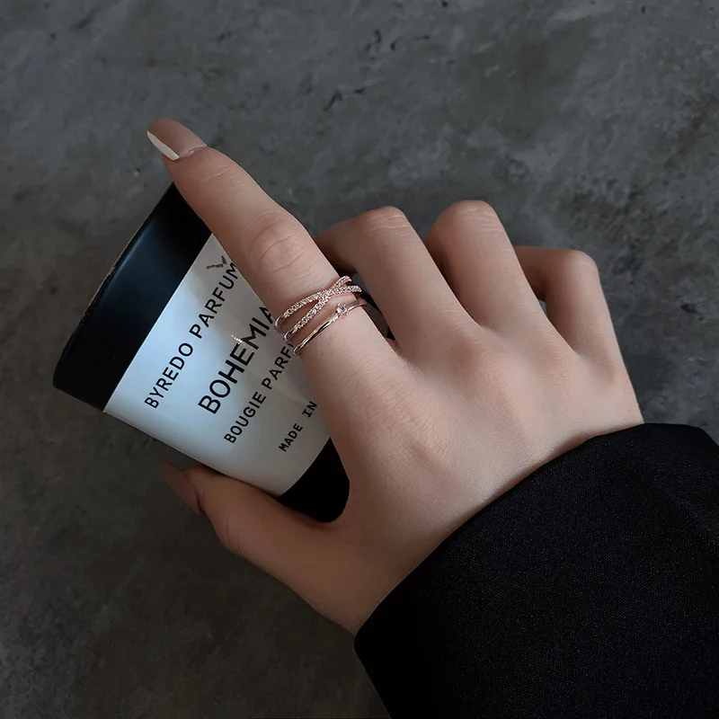 

The Zircon-encrusted Ultra-flash Cross Ring Female Niche Minimalist High-level Design Sense Open Index Finger Ring