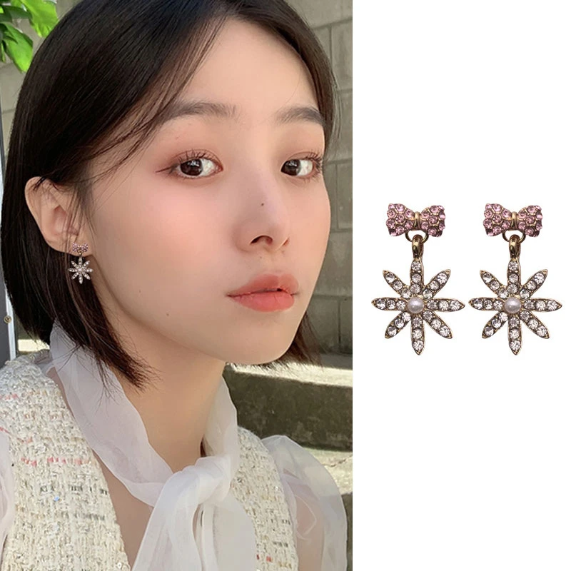 

Новые универсальные инкрустированные изысканные серьги-подвески с восьмиконечной звездой и бантом, модные темпераментные классические по...