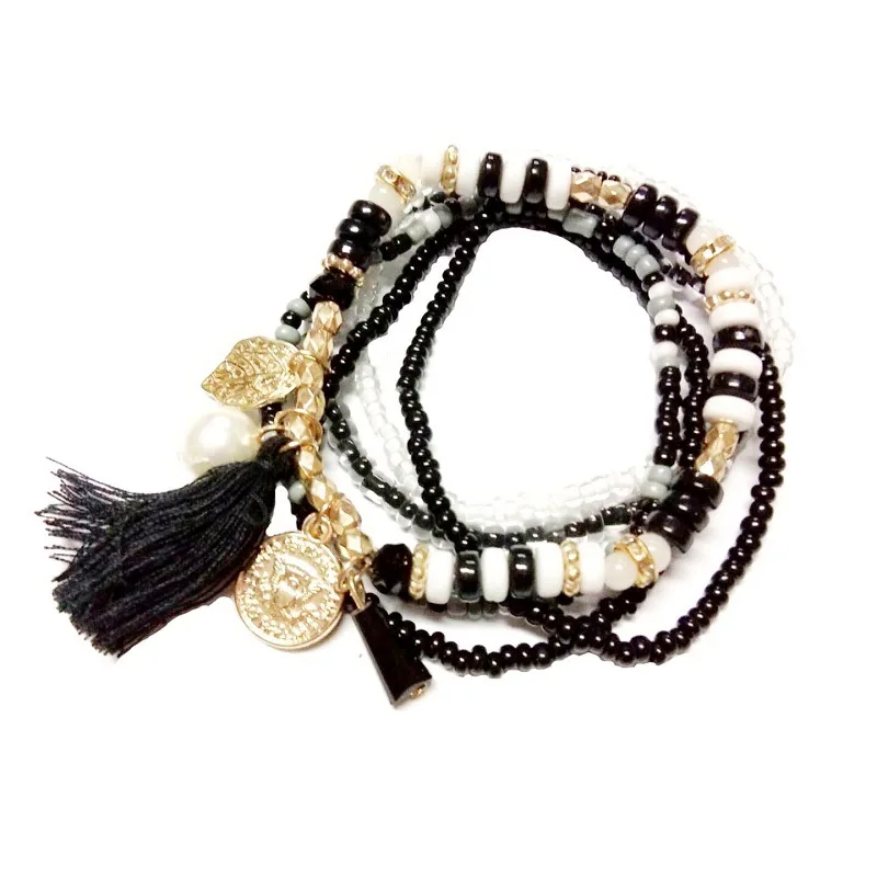 Женский браслет регулируемый с кисточками золотого и черного цвета|Плетеные