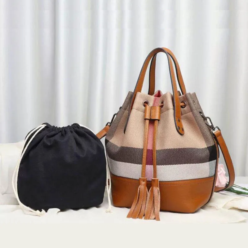 

2020 New women's bag lattice canvas bag leather drawstring bucket bag large capacity messenger handbag Women's famous brand