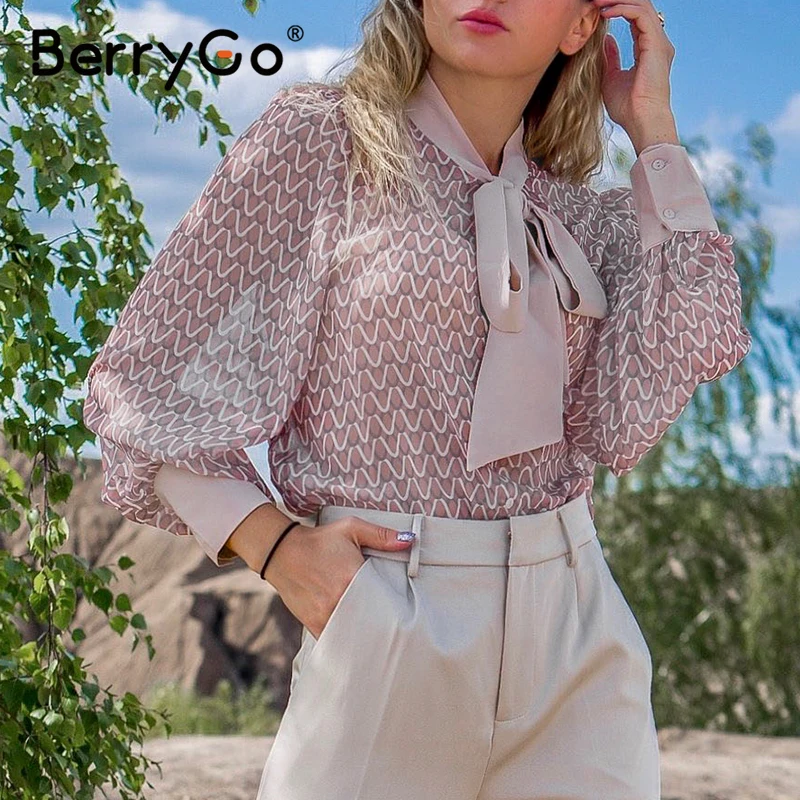 Женская блузка с геометрическим рисунком длинным рукавом и завязкой на