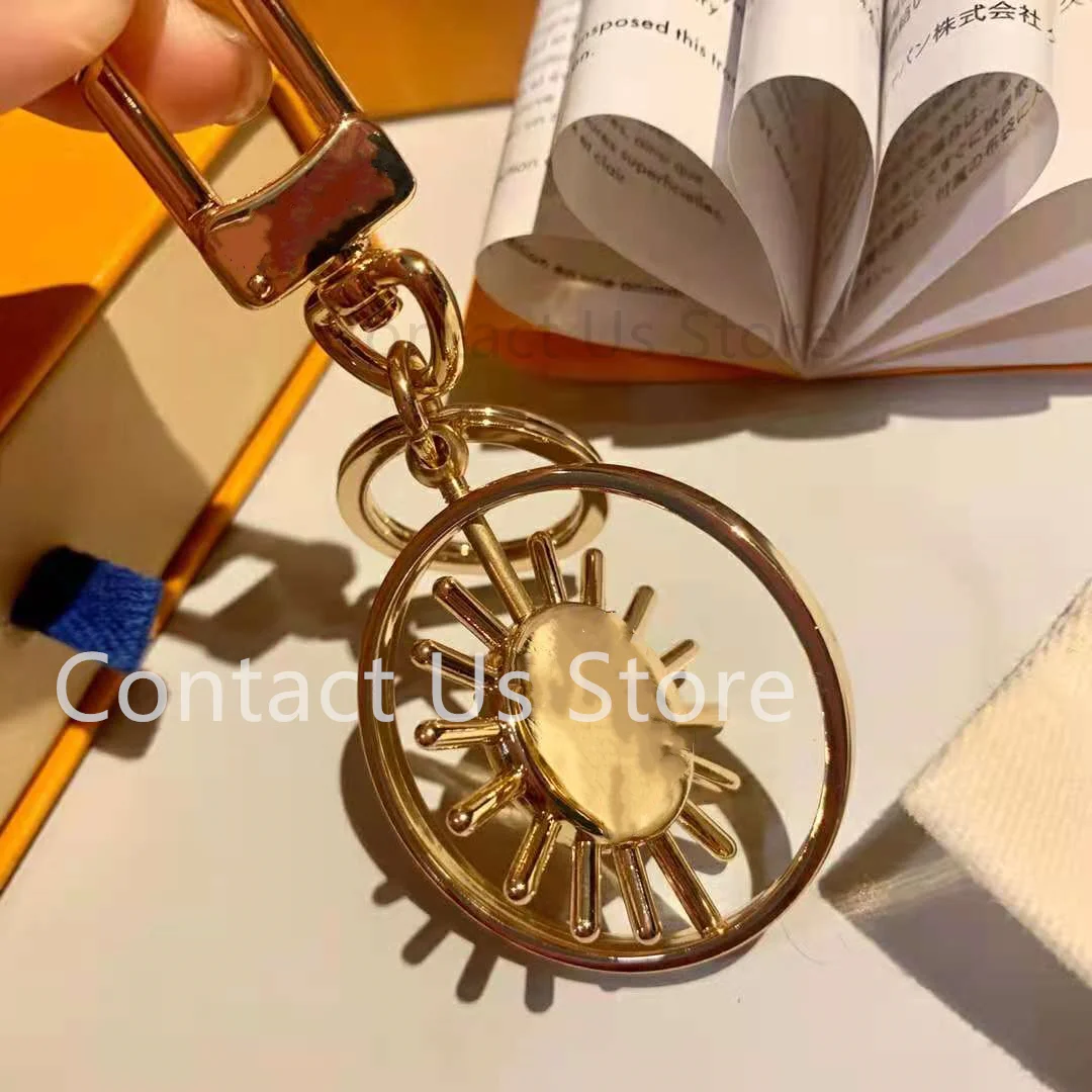 

2021 New Luxury Sunflower Rotatable Keychain High-end Brand Presbyopia Strap Bag Accessories Car Pendant Lady Birthday Gift