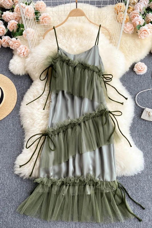 

seaside holiday dress is designed to feel like niche summer women's fairy mesh dress with irregular lotus leaf-side sling skirts